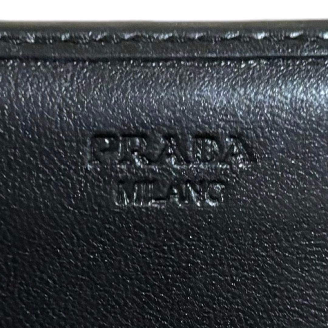 美品　希少　人気　プラダ　長財布　レザー　ブラック　アップリケ　顔　Wホック
