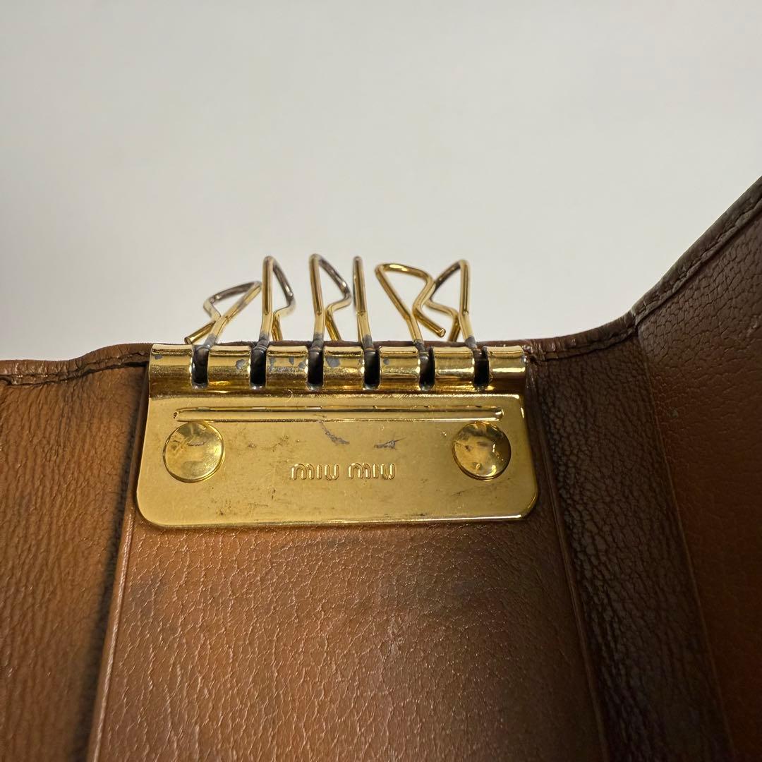 小物 MIUMIU studs leather key case