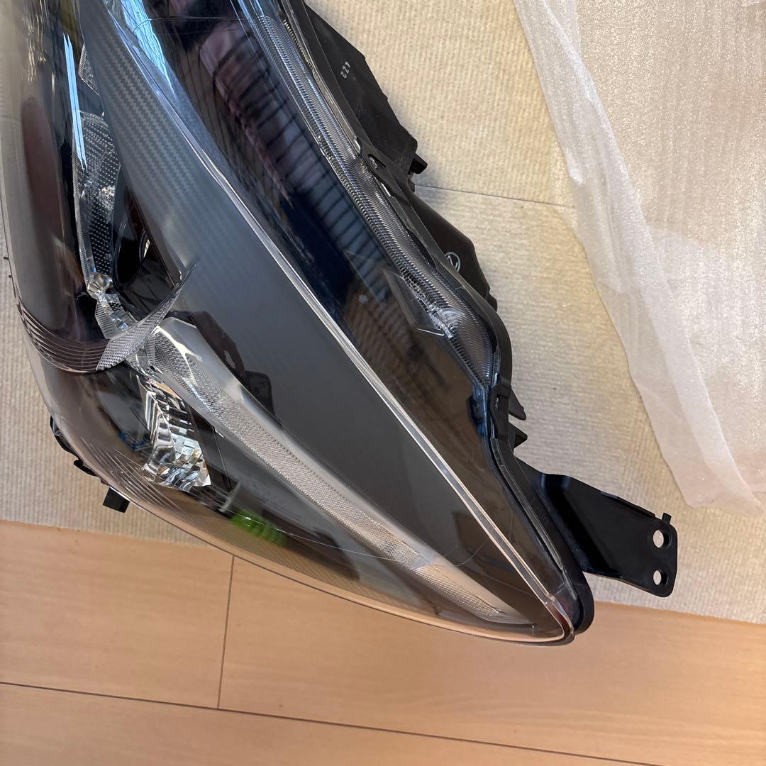 DJデミオ　左ヘッドランプ