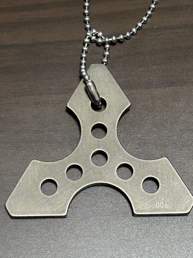 エコナイナー チタンアクセサリー POCKET DELTA 護身 クボタン