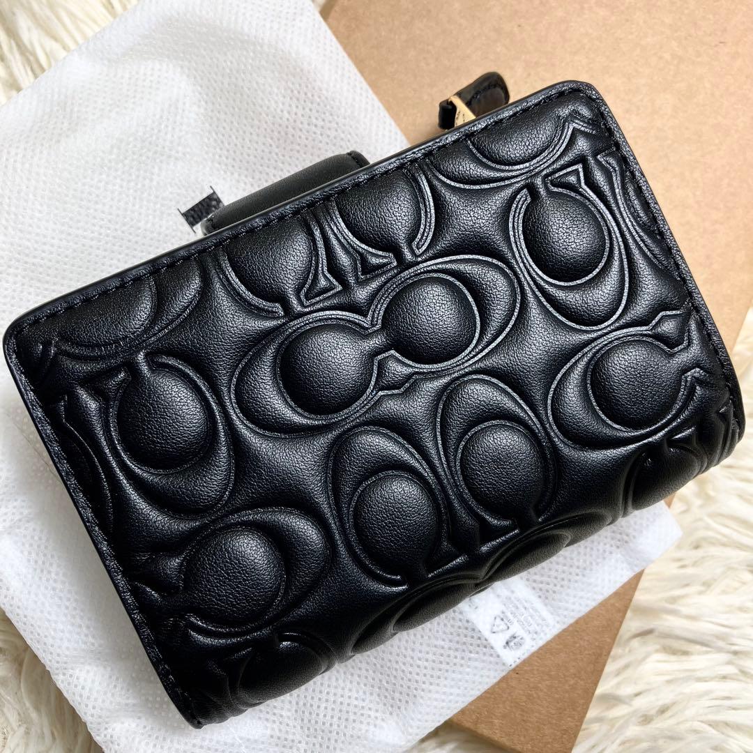 【未使用】 COACH 二つ折り シグネチャーエンボス