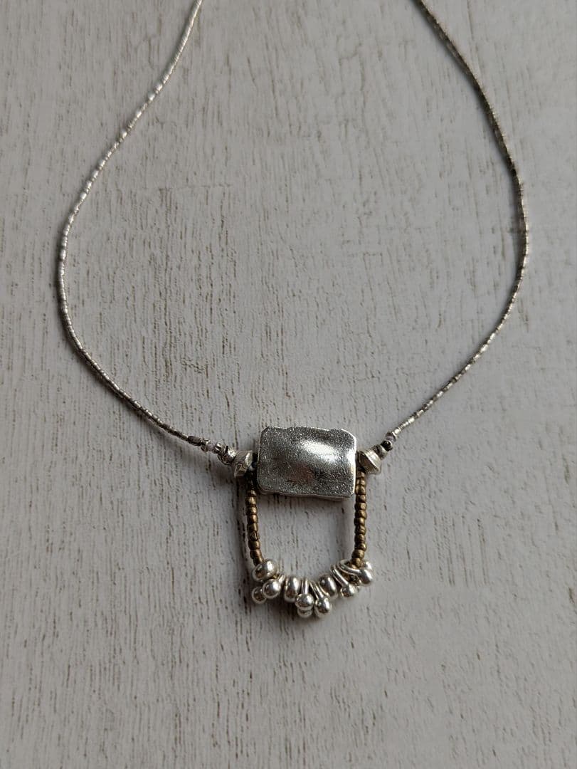 カレンシルバーのペンダントネックレス