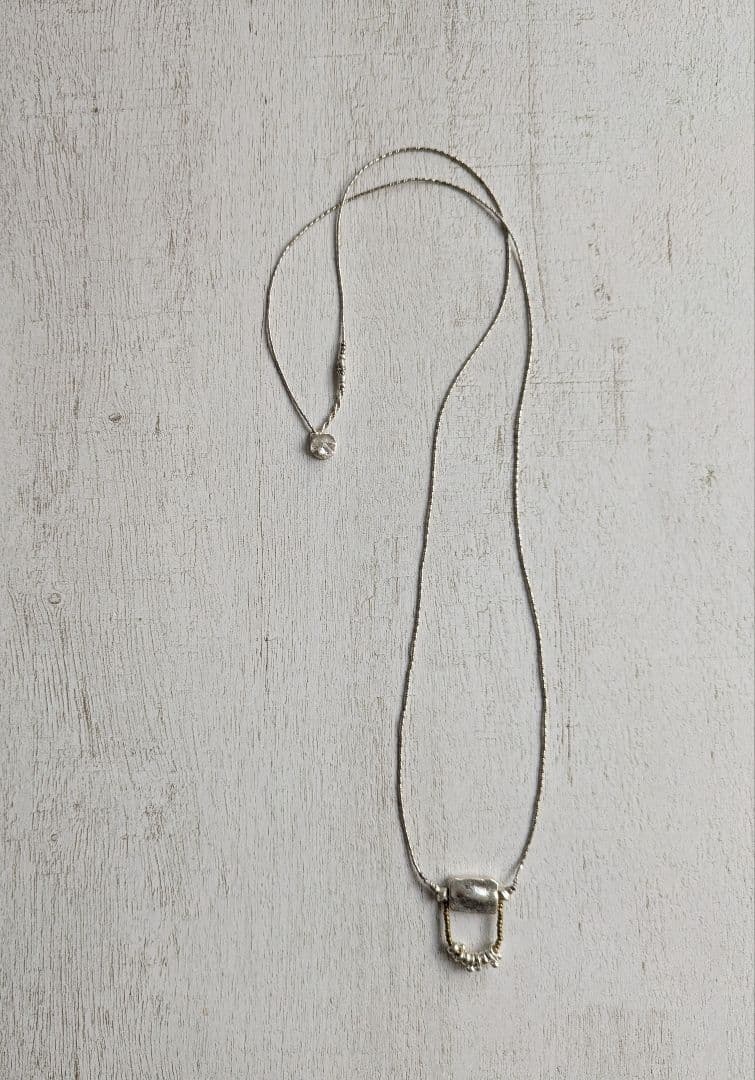 カレンシルバーのペンダントネックレス