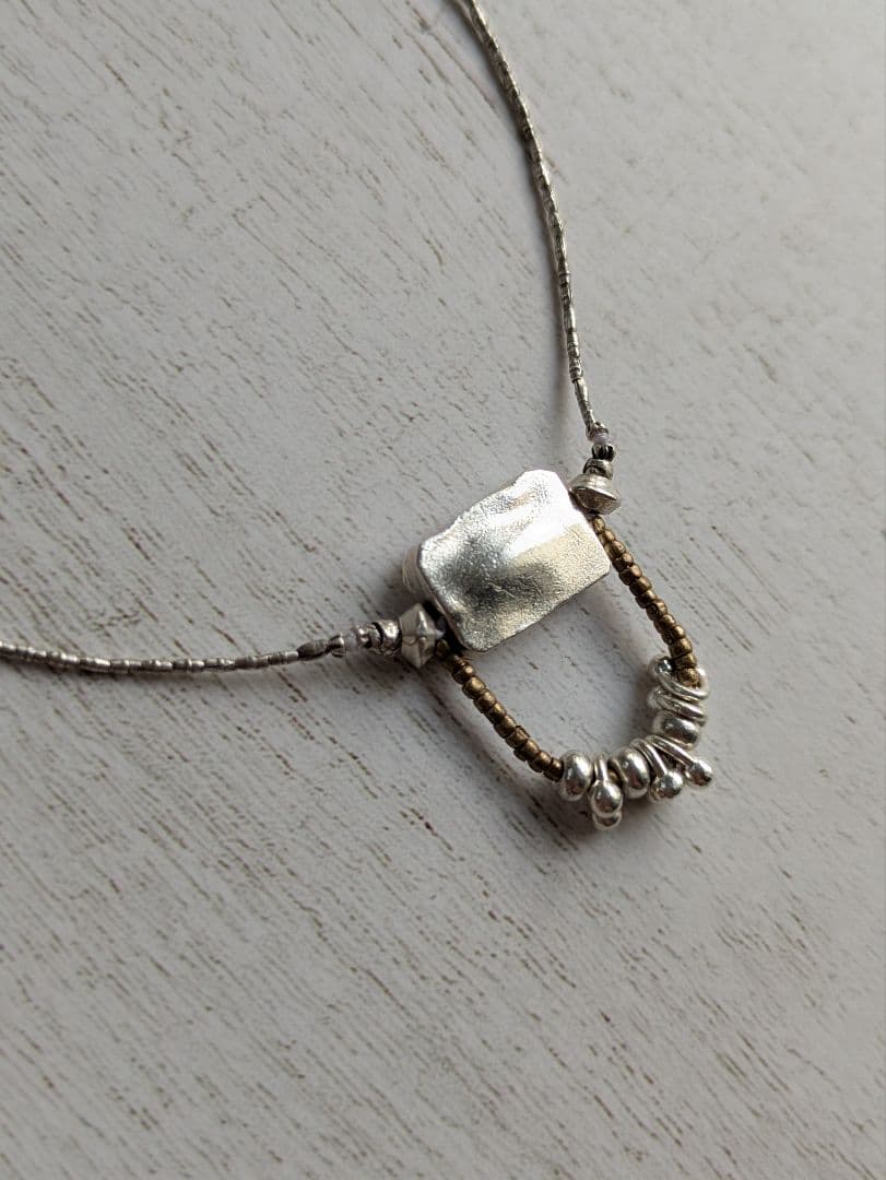 カレンシルバーのペンダントネックレス