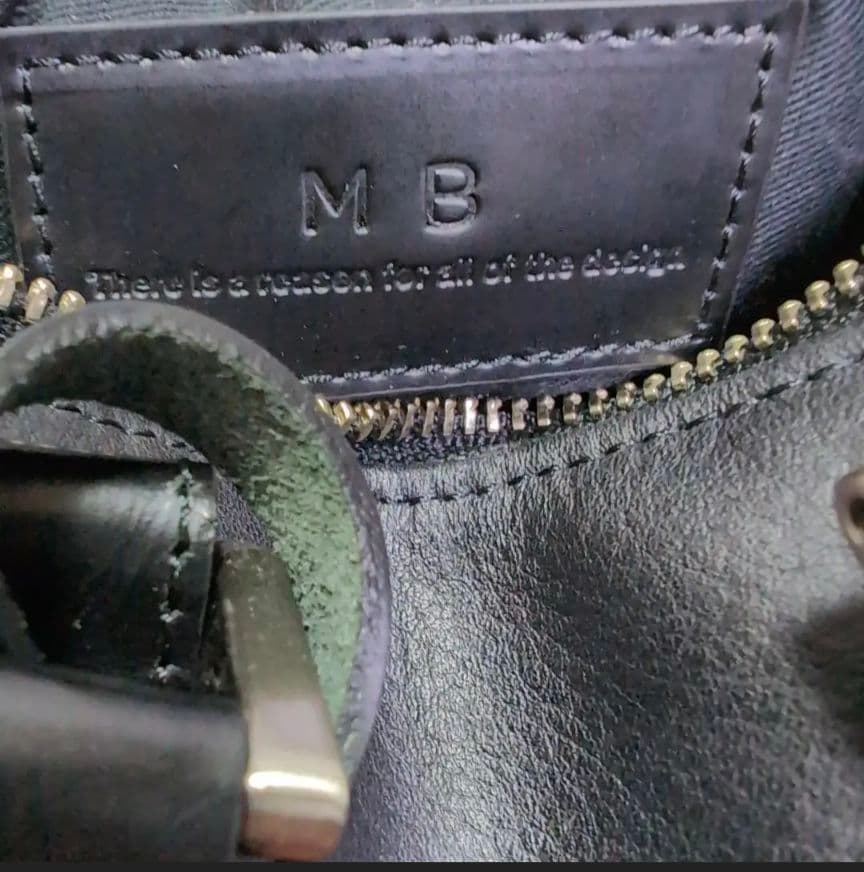 黒 レザー ハンドバッグ ドラムバッグ