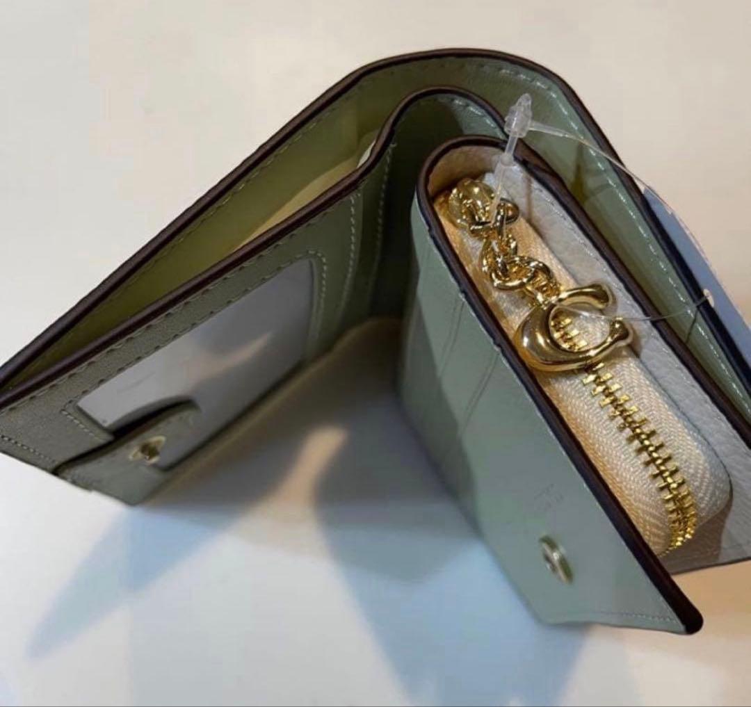 新品コーチCOACHパスキアコラボ二つ折り財布スナップウォレットホワイト.白