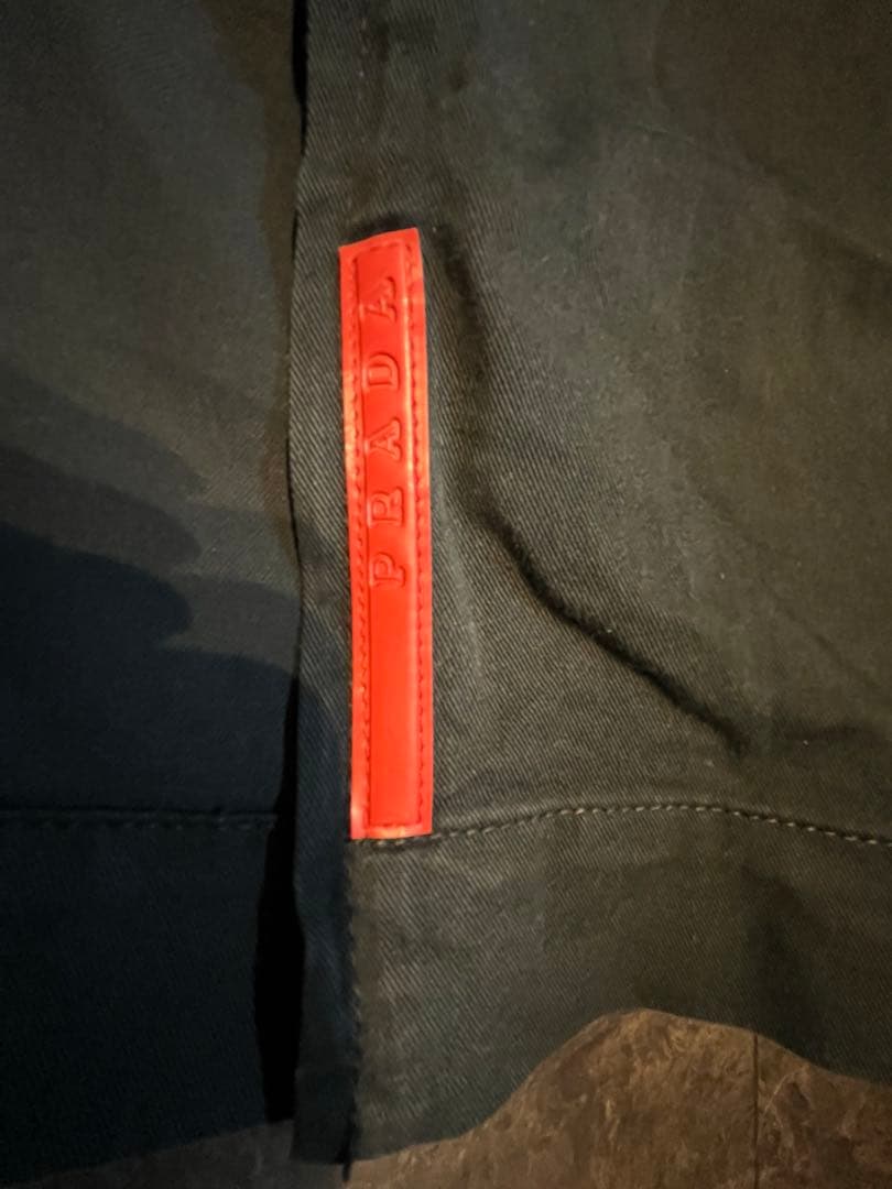 PRADA |サイドジッパー付きパンツ　赤タグプラダ