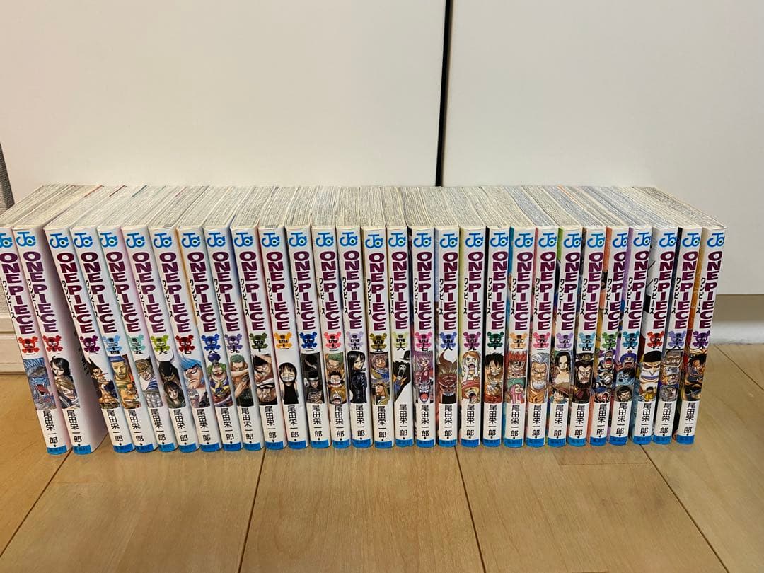 ワンピース　全巻（初版多数）1〜112巻　関連本　映画パンフレット　計128冊