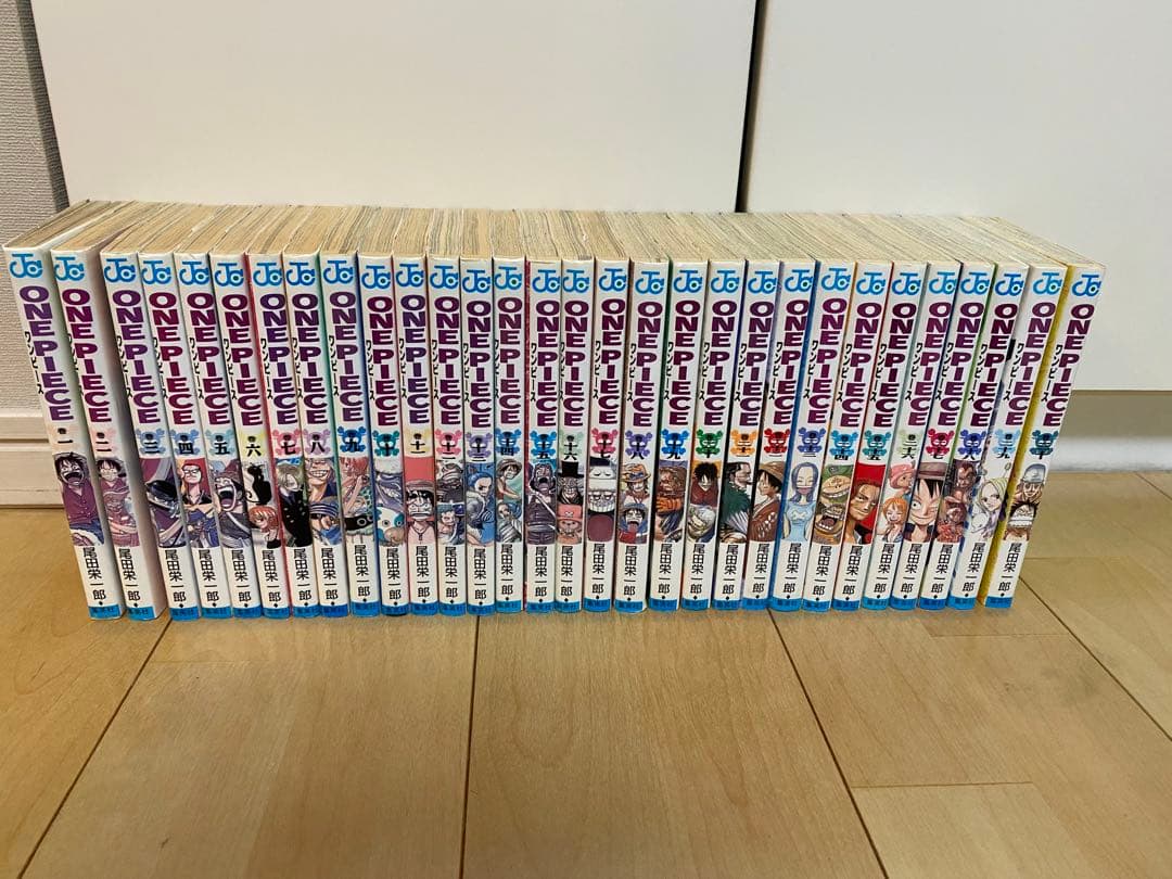 ワンピース　全巻（初版多数）1〜112巻　関連本　映画パンフレット　計128冊