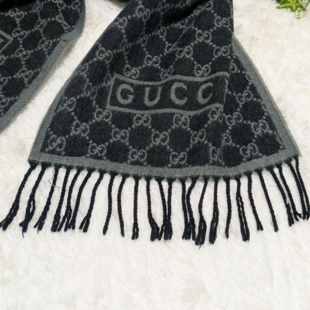 GUCCI グレー ロゴ マフラー フリンジ付き