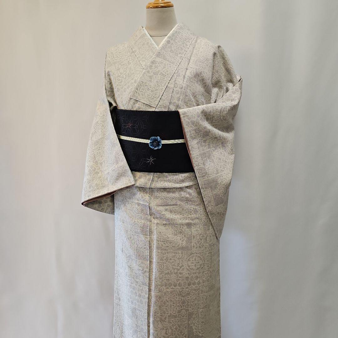 本真綿結城紬☆結城織物☆正絹☆結城紬☆仕付け付き☆薄いグレー地☆証紙あり