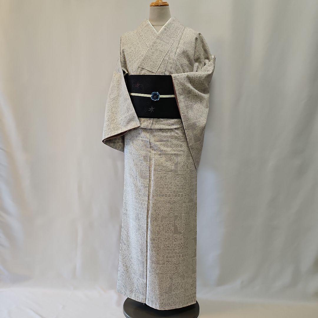 本真綿結城紬☆結城織物☆正絹☆結城紬☆仕付け付き☆薄いグレー地☆証紙あり