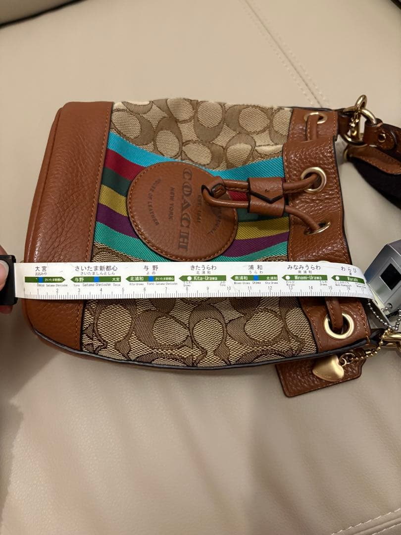 バッグ COACH Dempsey Drawstring Bucket 15