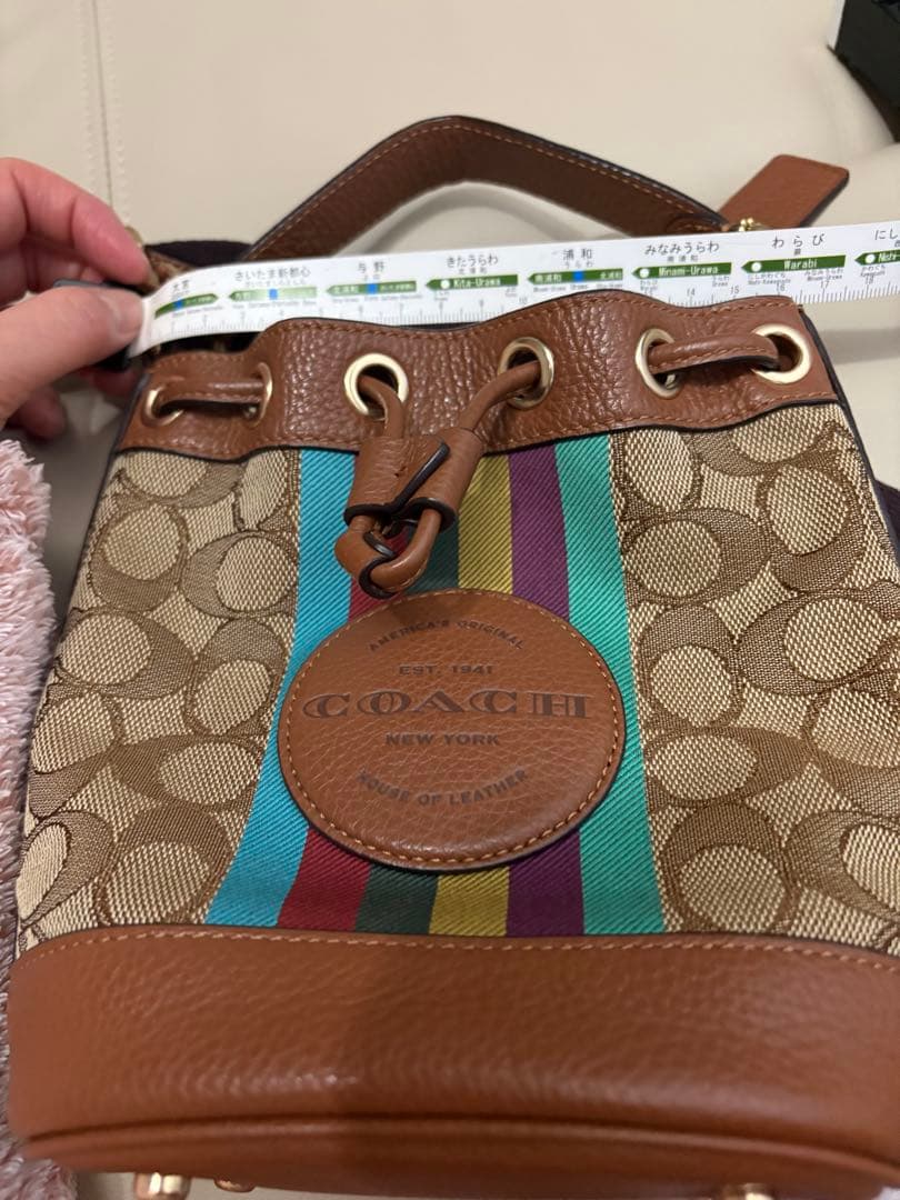 バッグ COACH Dempsey Drawstring Bucket 15