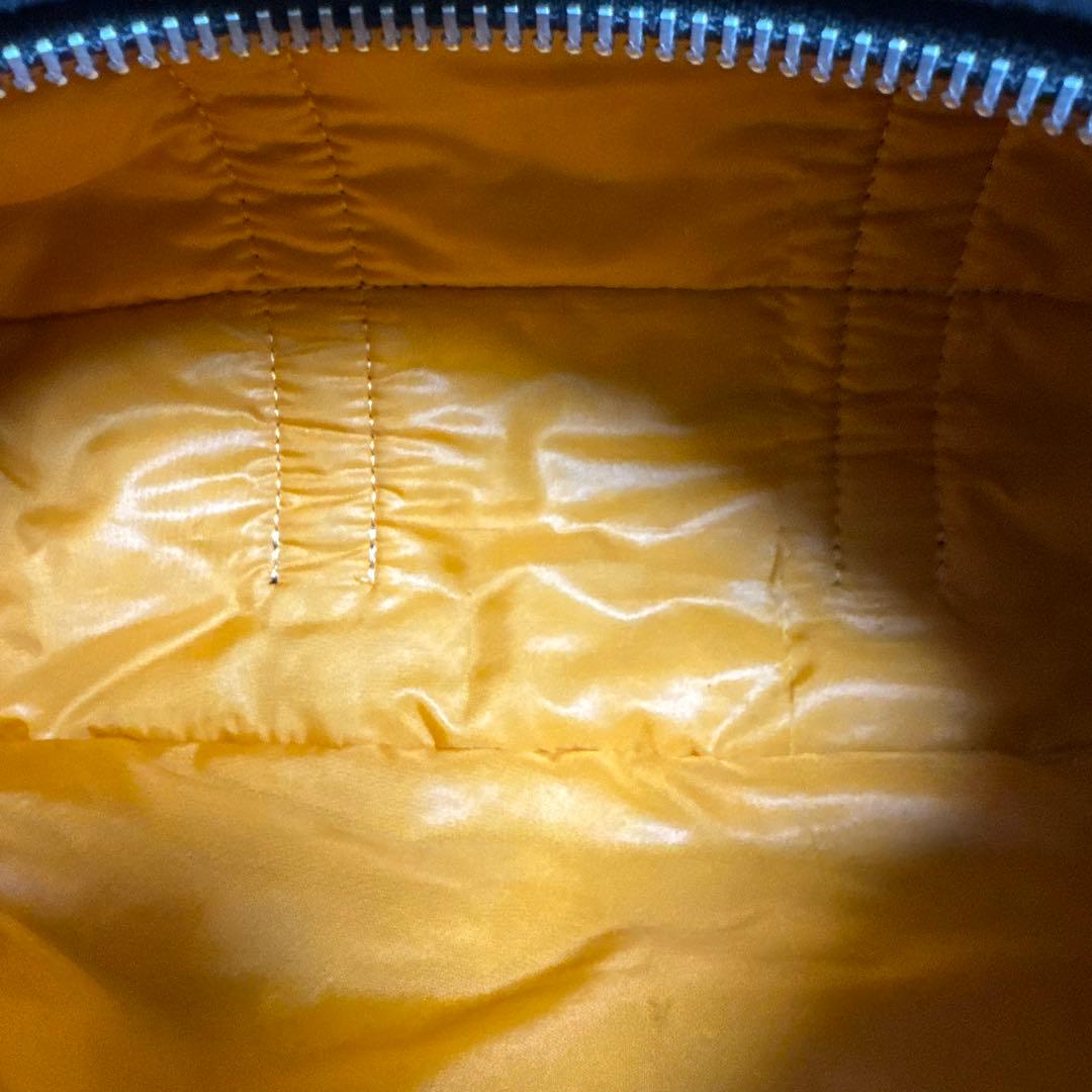 ポータータンカーブラック ×オレンジナイロン ドラムバッグ