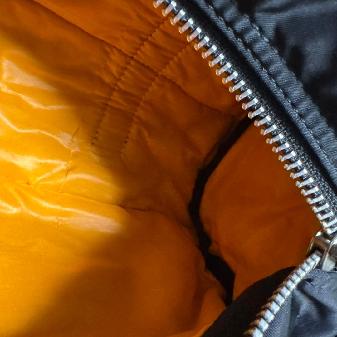 ポータータンカーブラック ×オレンジナイロン ドラムバッグ