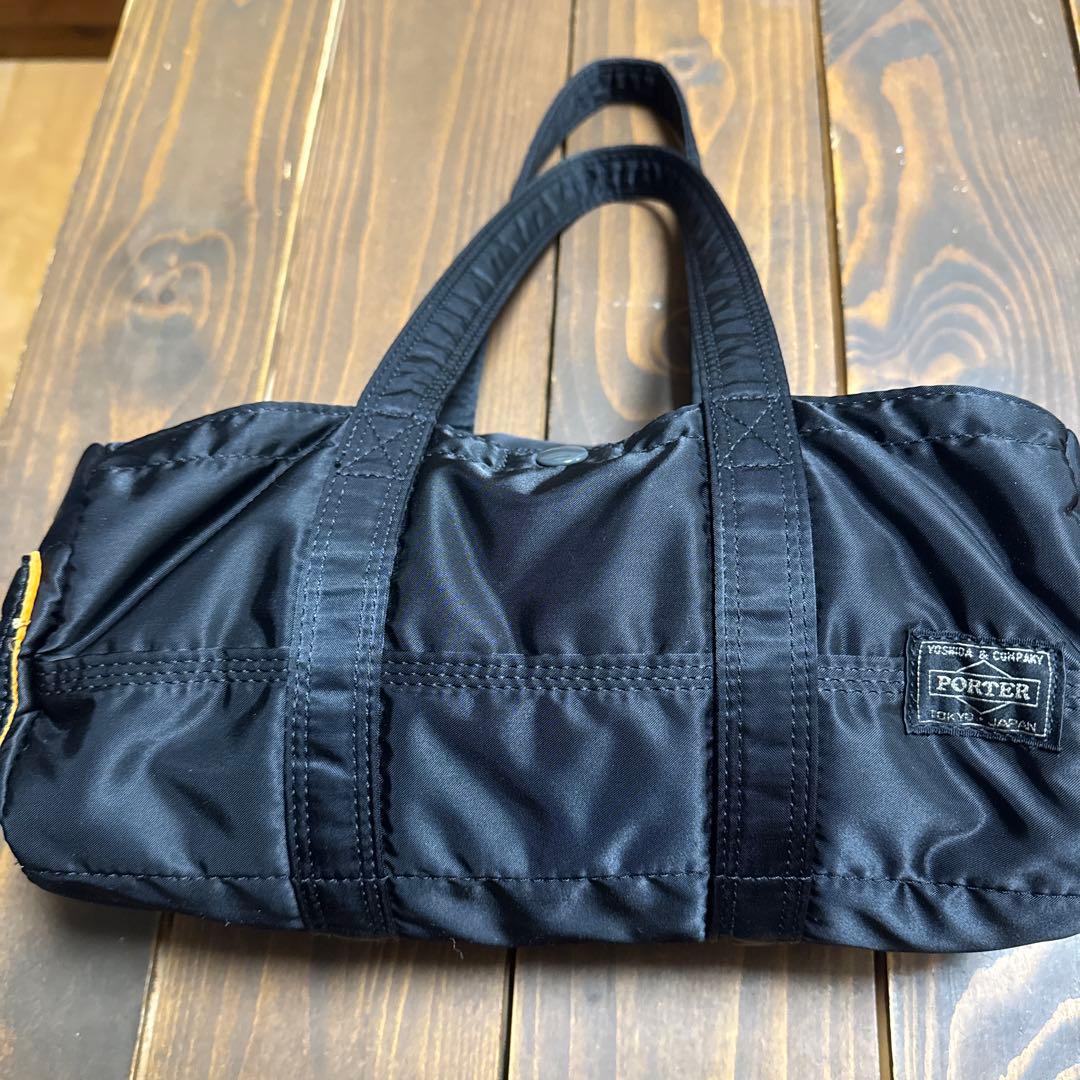 ポータータンカーブラック ×オレンジナイロン ドラムバッグ