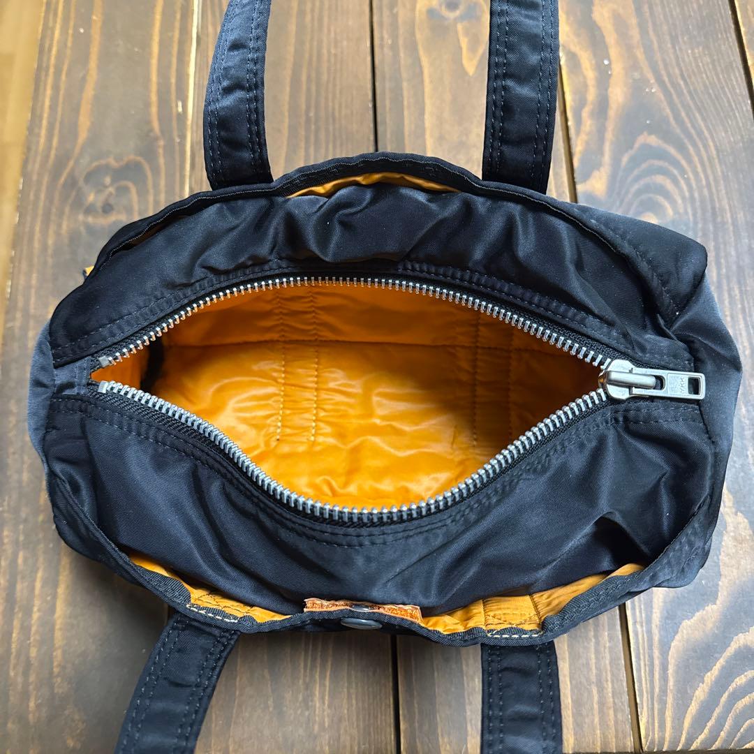 ポータータンカーブラック ×オレンジナイロン ドラムバッグ