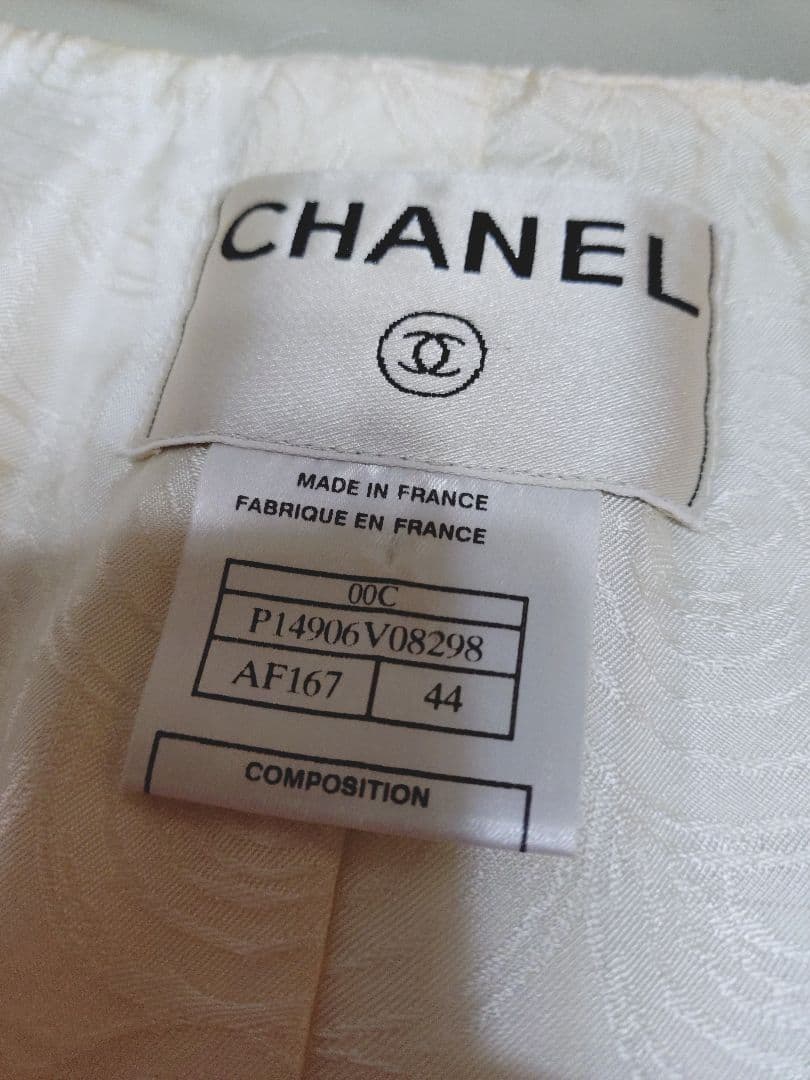 CHANELシャネルボタンノーカラーツイードジャケット フランス製