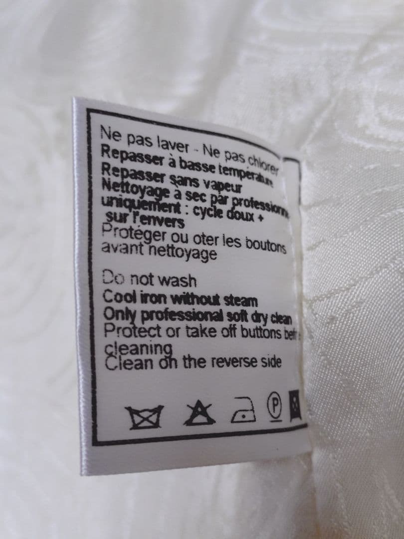 CHANELシャネルボタンノーカラーツイードジャケット フランス製