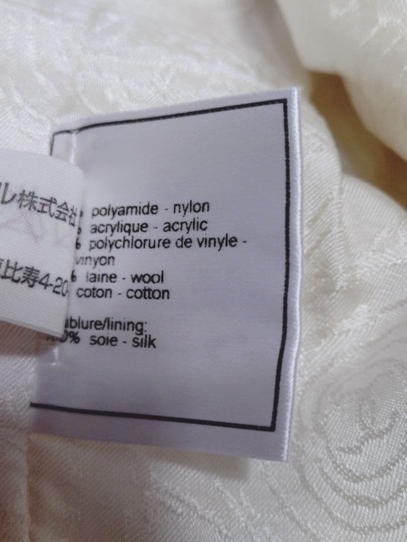 CHANELシャネルボタンノーカラーツイードジャケット フランス製