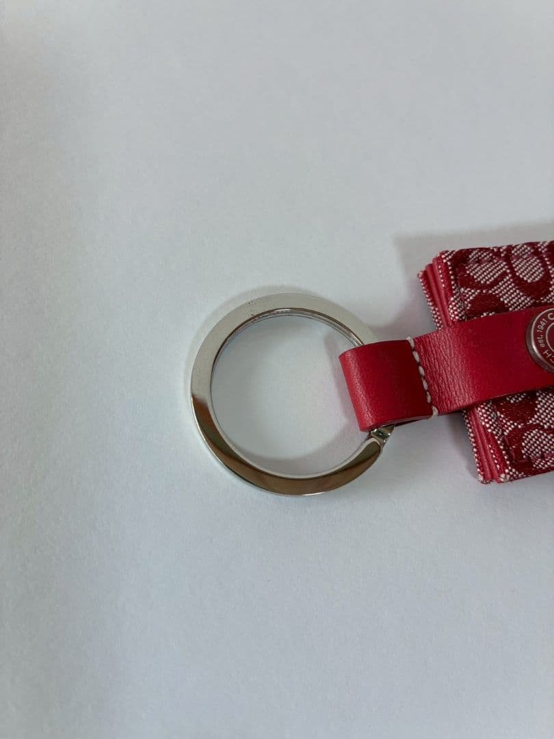 コーチ　シグネチャー柄　ミニフォトケース付き　キーリング