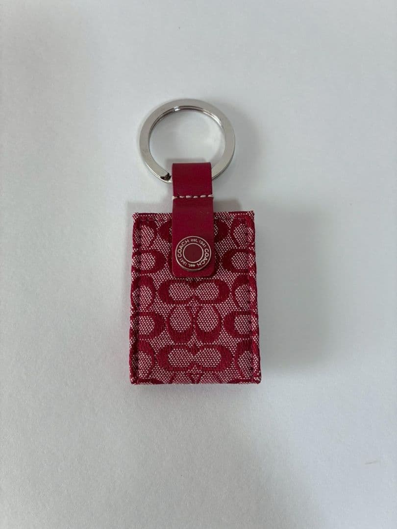 コーチ　シグネチャー柄　ミニフォトケース付き　キーリング