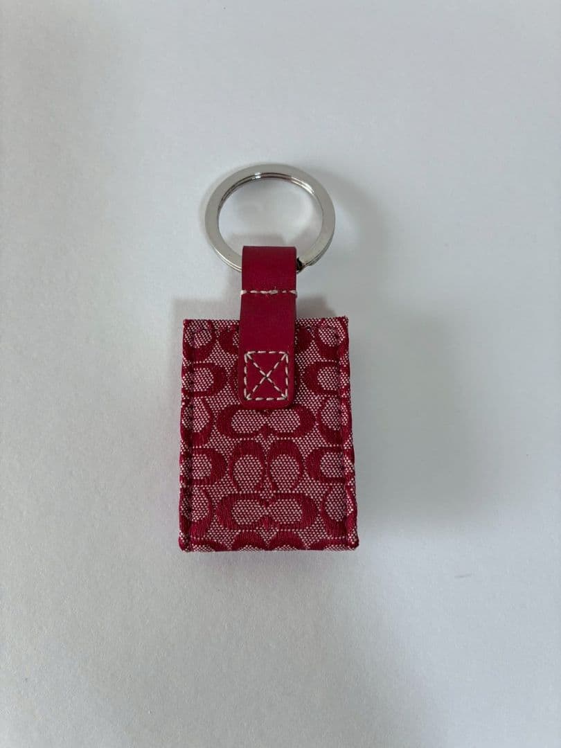 コーチ　シグネチャー柄　ミニフォトケース付き　キーリング