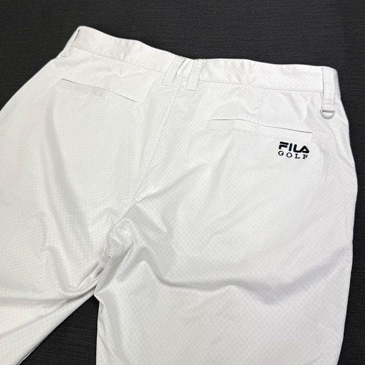 新品フィラ ゴルフ 上下セット 4WAYストレッチ ライトボンディング 白 3L
