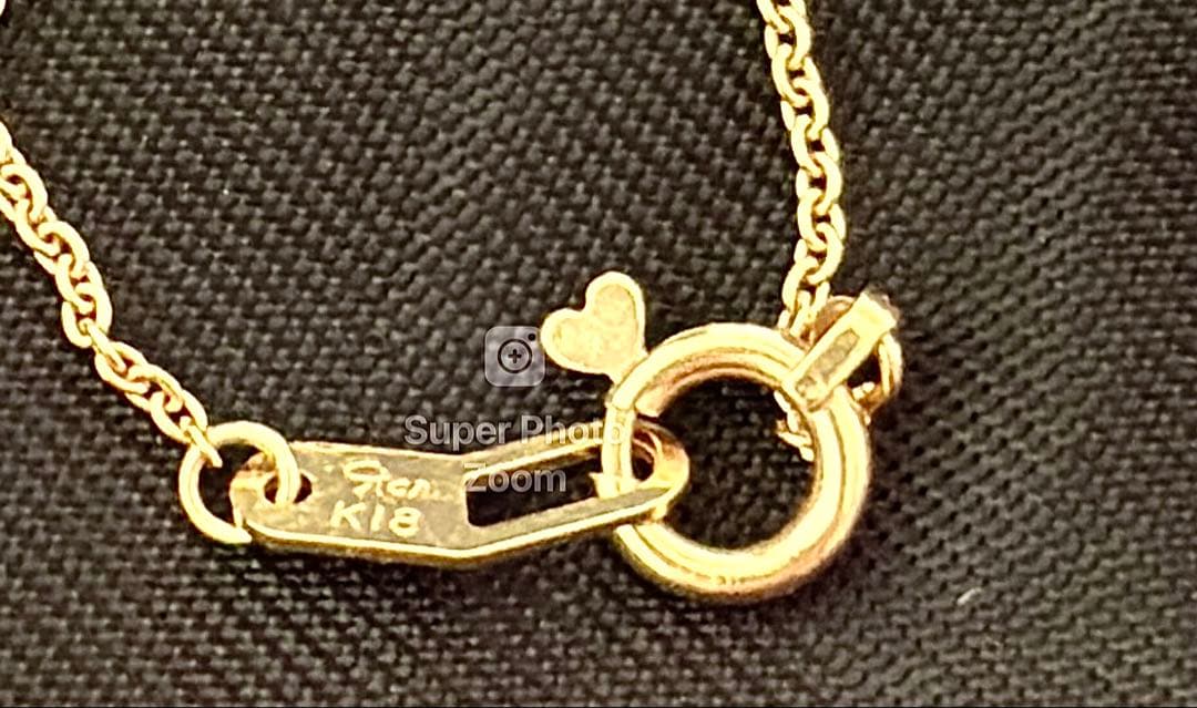 スタージュエリー　K18ダイヤクロスネックレス