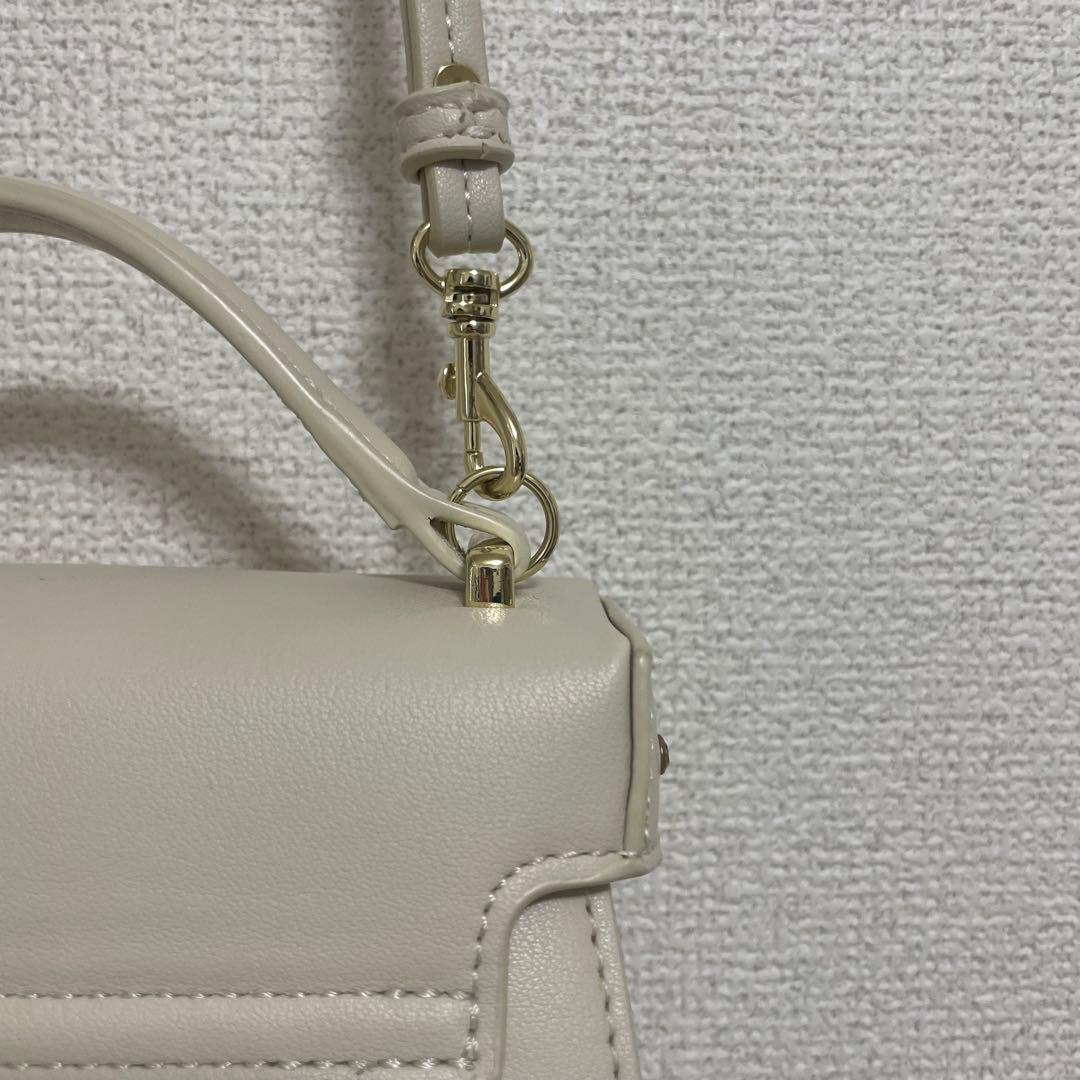 【リュタン】ビジュースタッズポシェット アイボリー