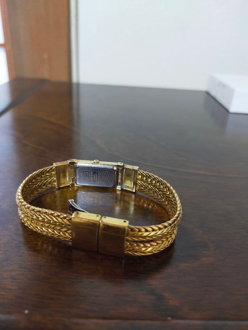 SEIKOのゴールド 編み込みデザイン 腕時計