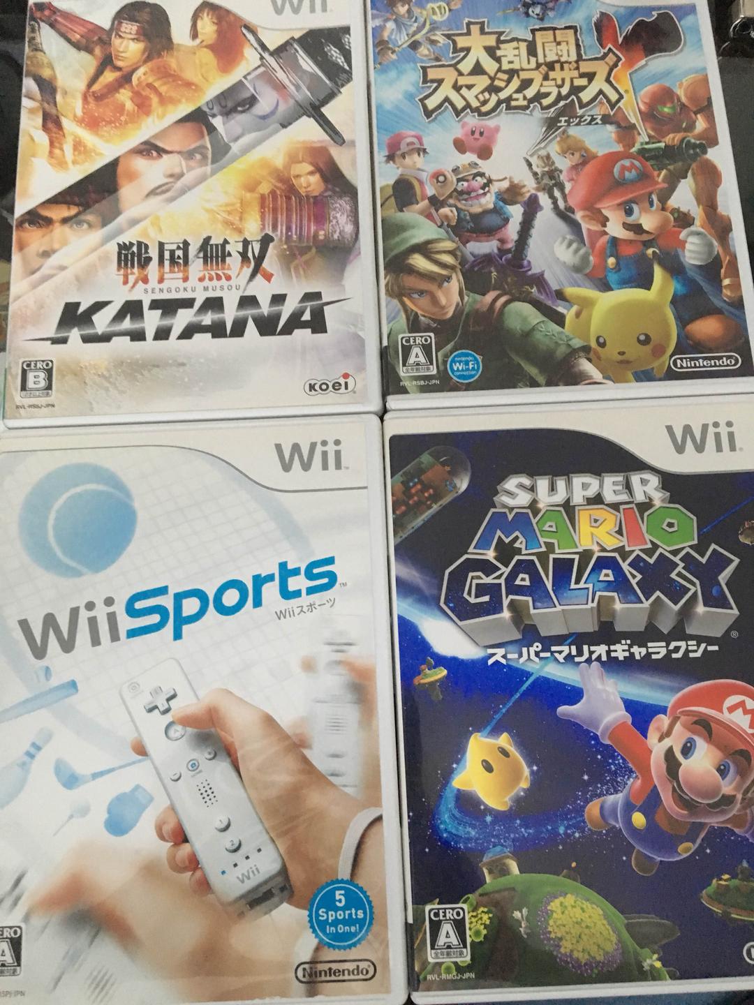 wii 本体 + カセット4つ