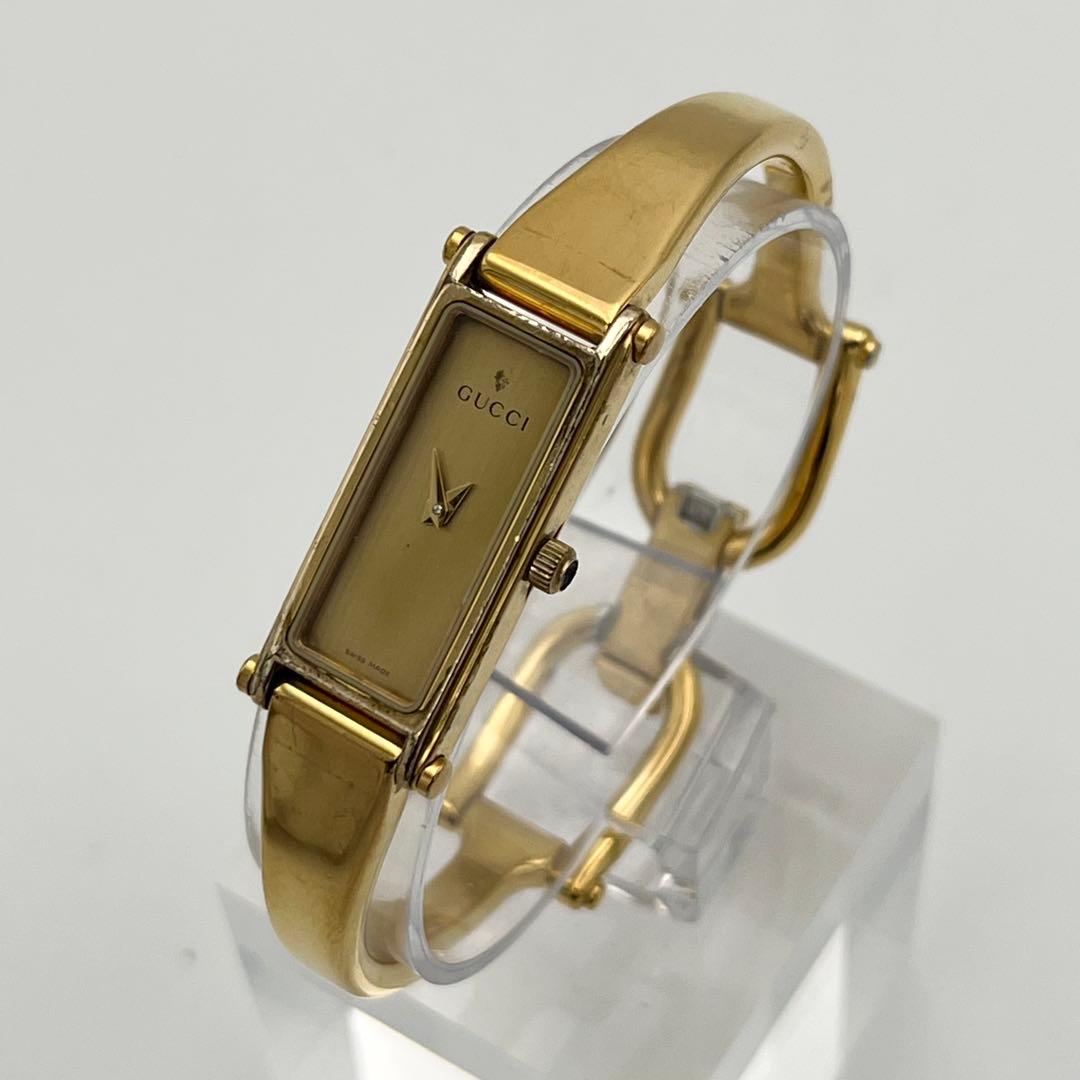 新品電池 GUCCI 1500L ゴールド文字盤 ベゼル バングルウォッチ 時計