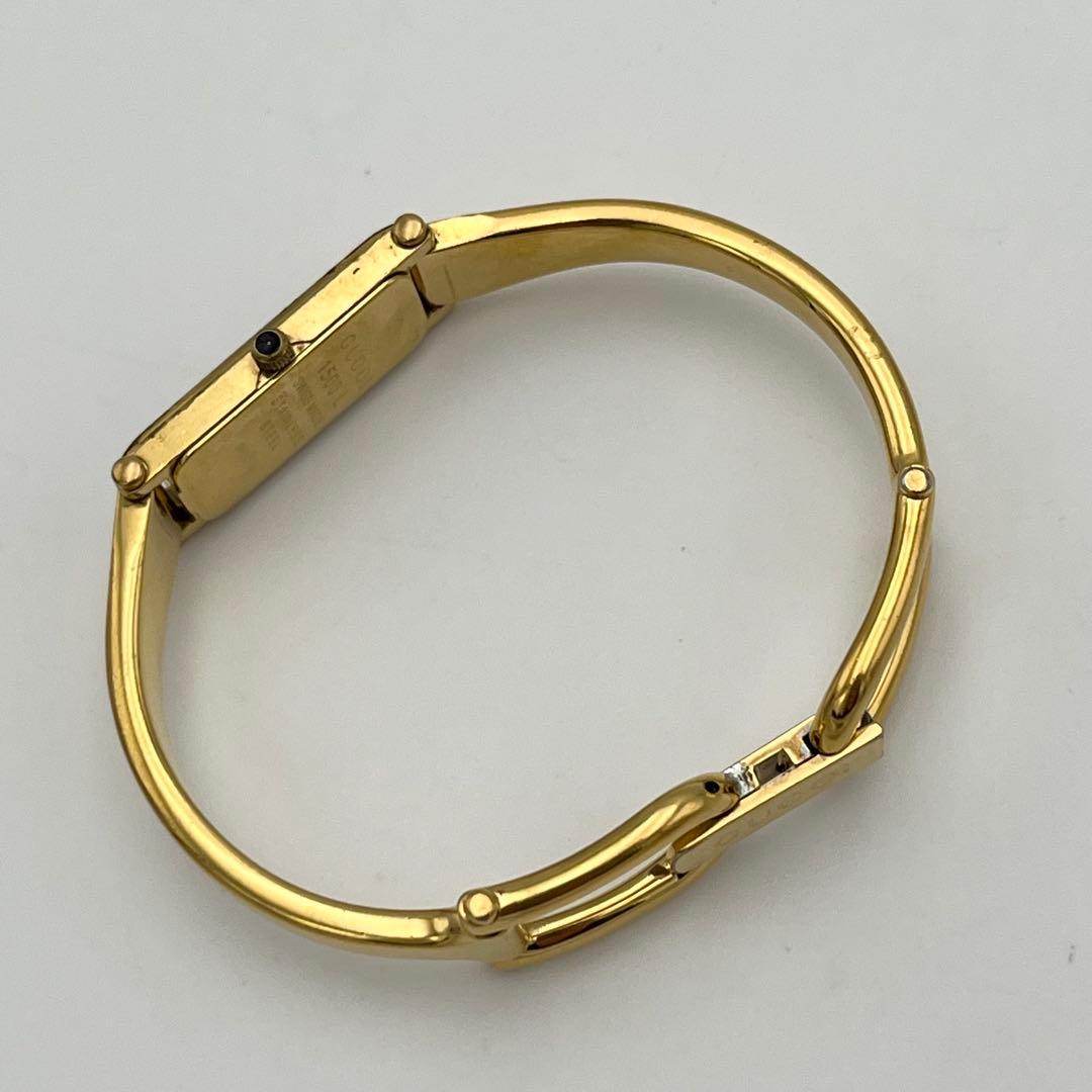 新品電池 GUCCI 1500L ゴールド文字盤 ベゼル バングルウォッチ 時計