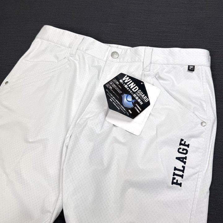 新品フィラ ゴルフ 上下セット 4WAYストレッチ ライトボンディング 白 LL