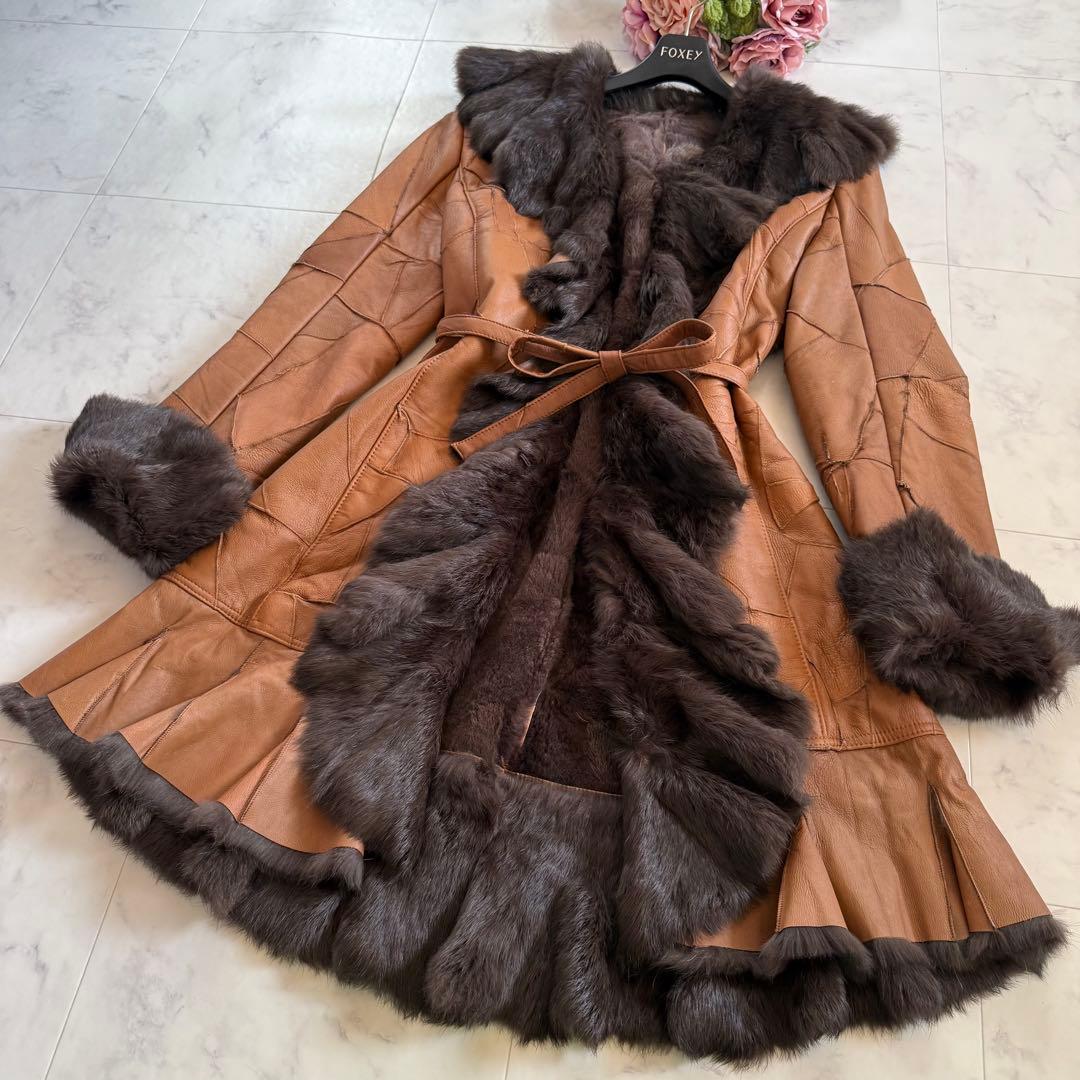 美品★ラビットファー 毛皮 羊革 女優襟 ロングベルテッドコート フリル L