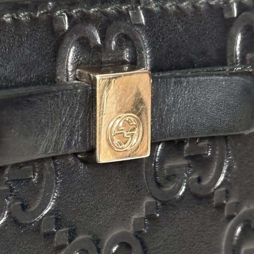グッチ 財布 ラウンドファスナー GG シマ リボン インターロッキング　黒