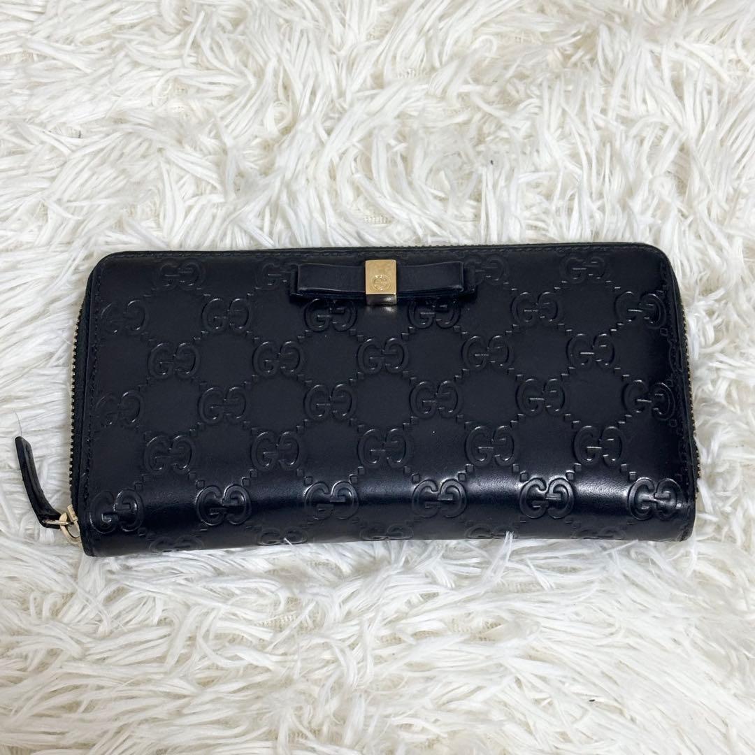 グッチ 財布 ラウンドファスナー GG シマ リボン インターロッキング　黒