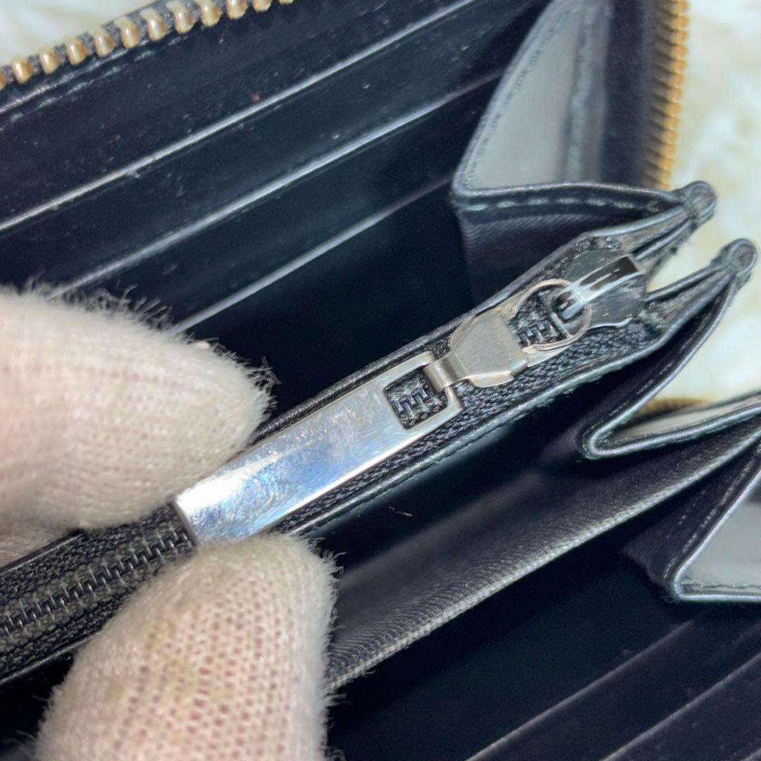 グッチ 財布 ラウンドファスナー GG シマ リボン インターロッキング　黒