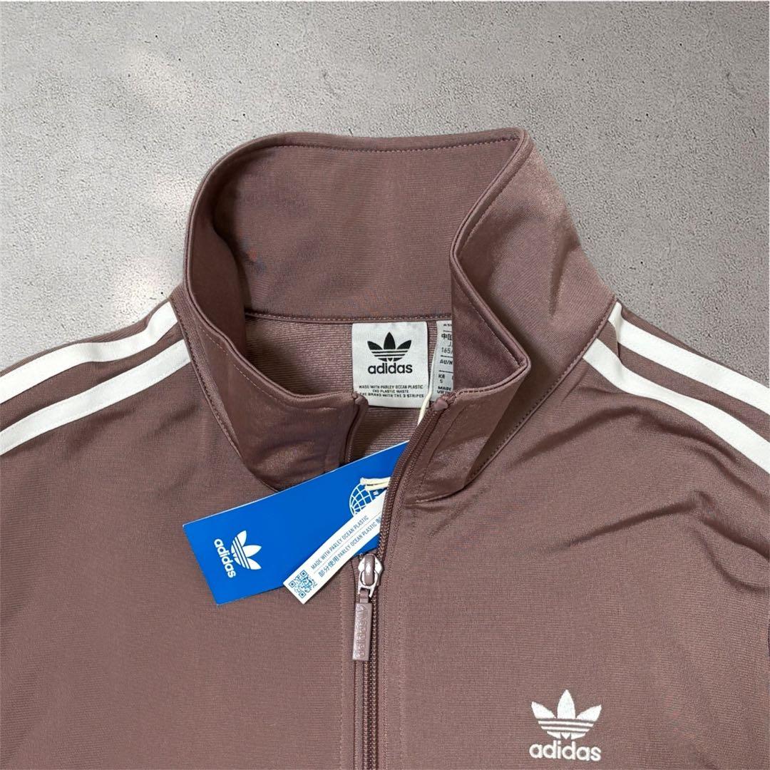 adidas くすみピンク ファイヤーバード 襟高 トラックトップ ジャージ