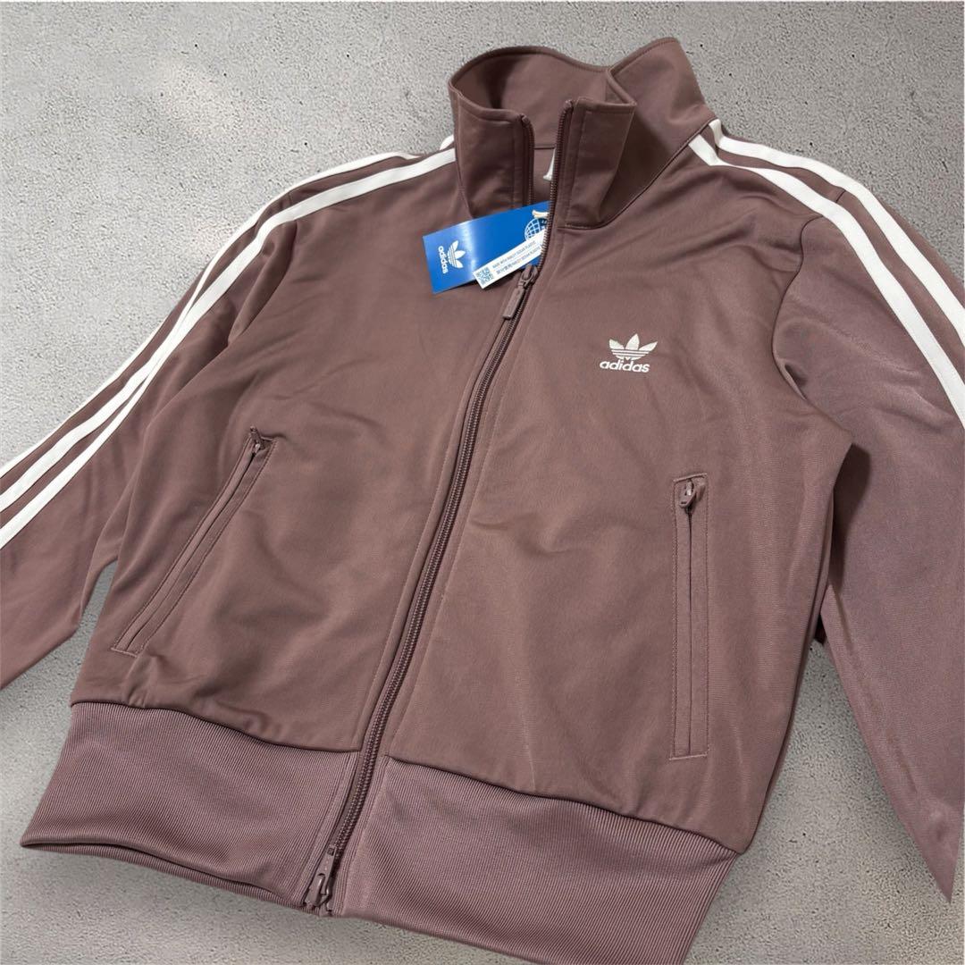 adidas くすみピンク ファイヤーバード 襟高 トラックトップ ジャージ