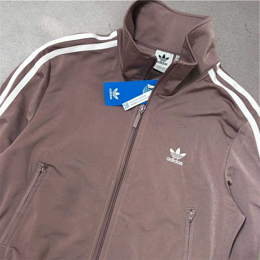 adidas くすみピンク ファイヤーバード 襟高 トラックトップ ジャージ