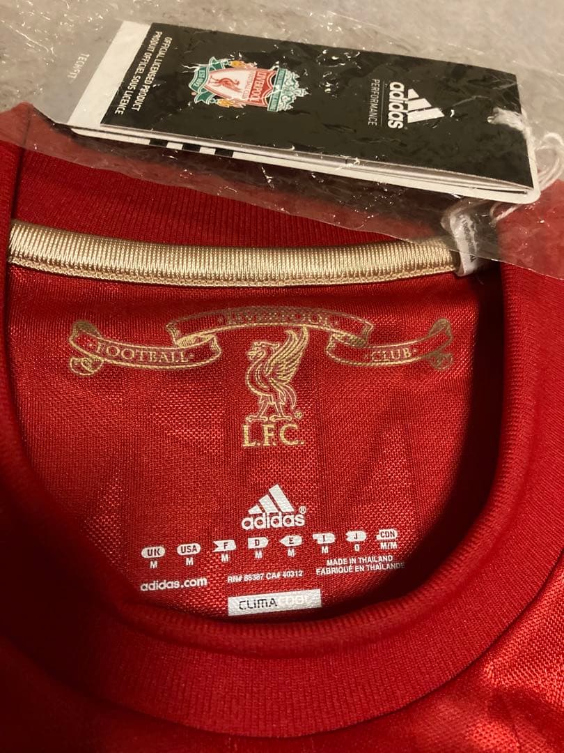 リバプールFC10/12選手モデルユニフォーム&特製記念ペナント[限定BOX]