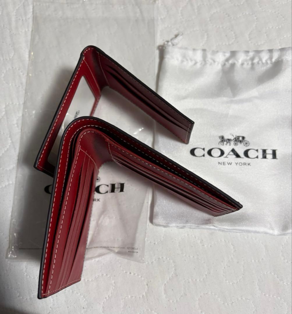 コーチ折りたたみ財布　カードケーススヌーピー新商品