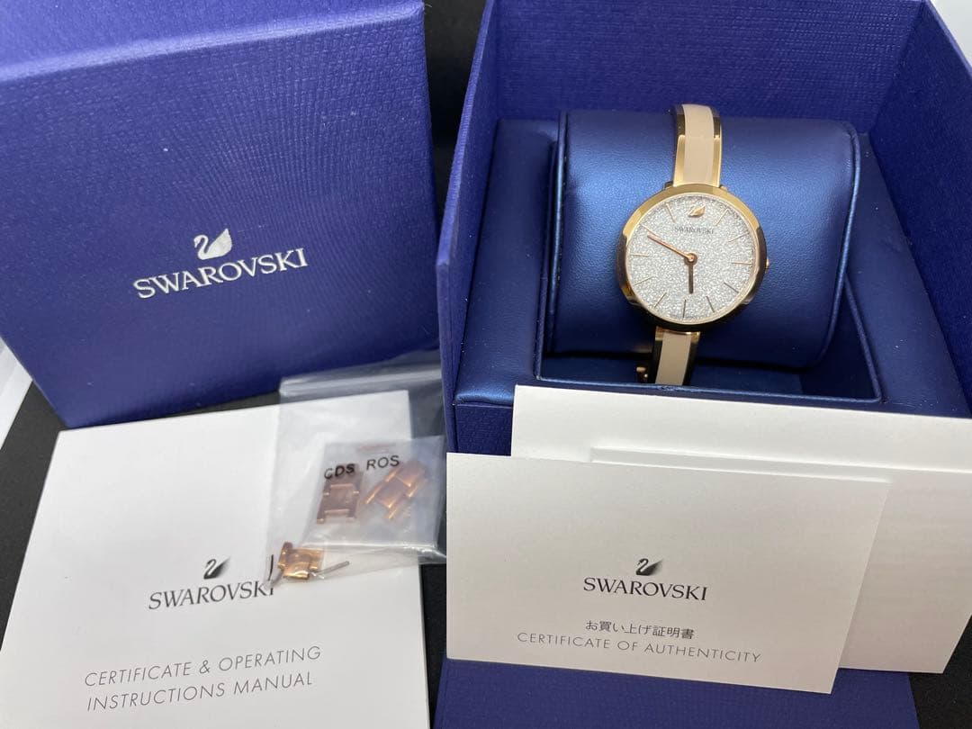 SWAROVSKI 腕時計 ゴールド　スワロフスキー ウォッチ箱付き　コマ　稼働