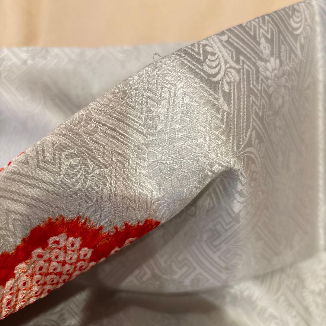 芸舞妓さんのようなはんなりした着こなし　絞り名古屋帯　水色に雲取り　ゑり萬畳紙付