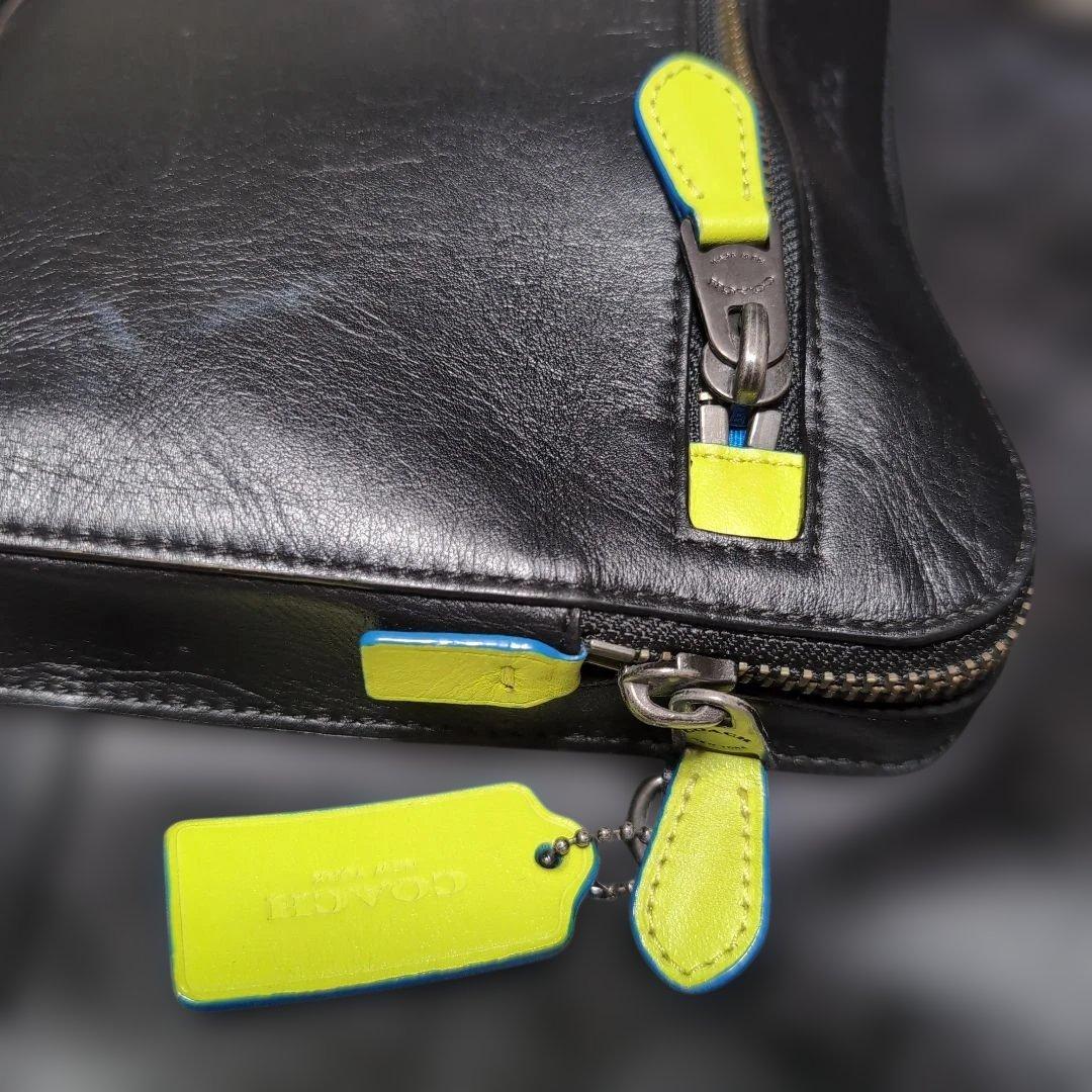 コーチ　レザーリュック 黒/ネオンイエロー