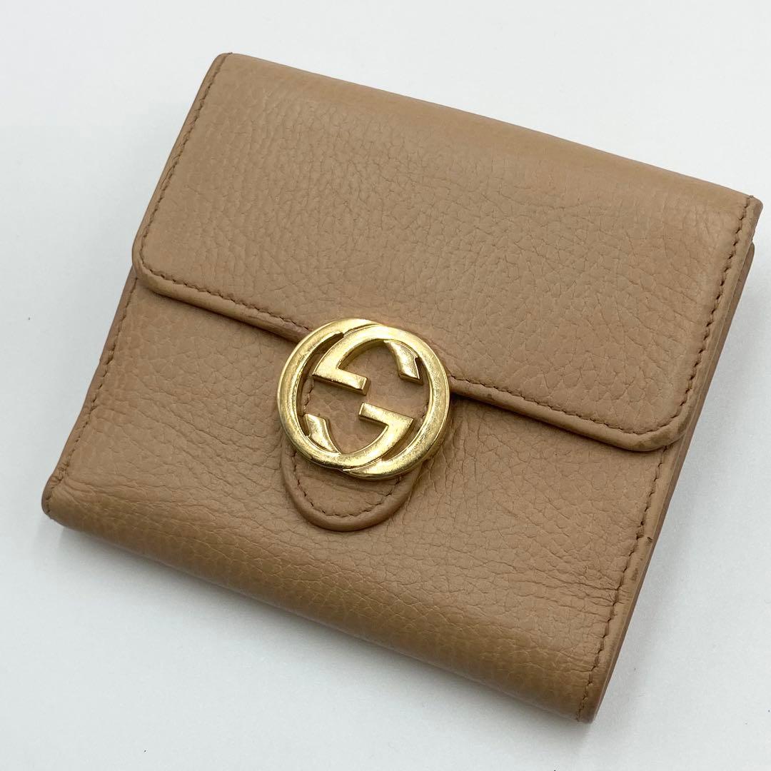 GUCCI インターロッキングG ダラーカーフ 二つ折り財布 ゴールド　ベージュ