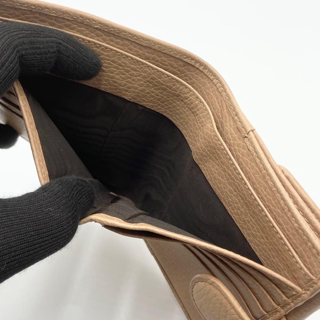 GUCCI インターロッキングG ダラーカーフ 二つ折り財布 ゴールド　ベージュ